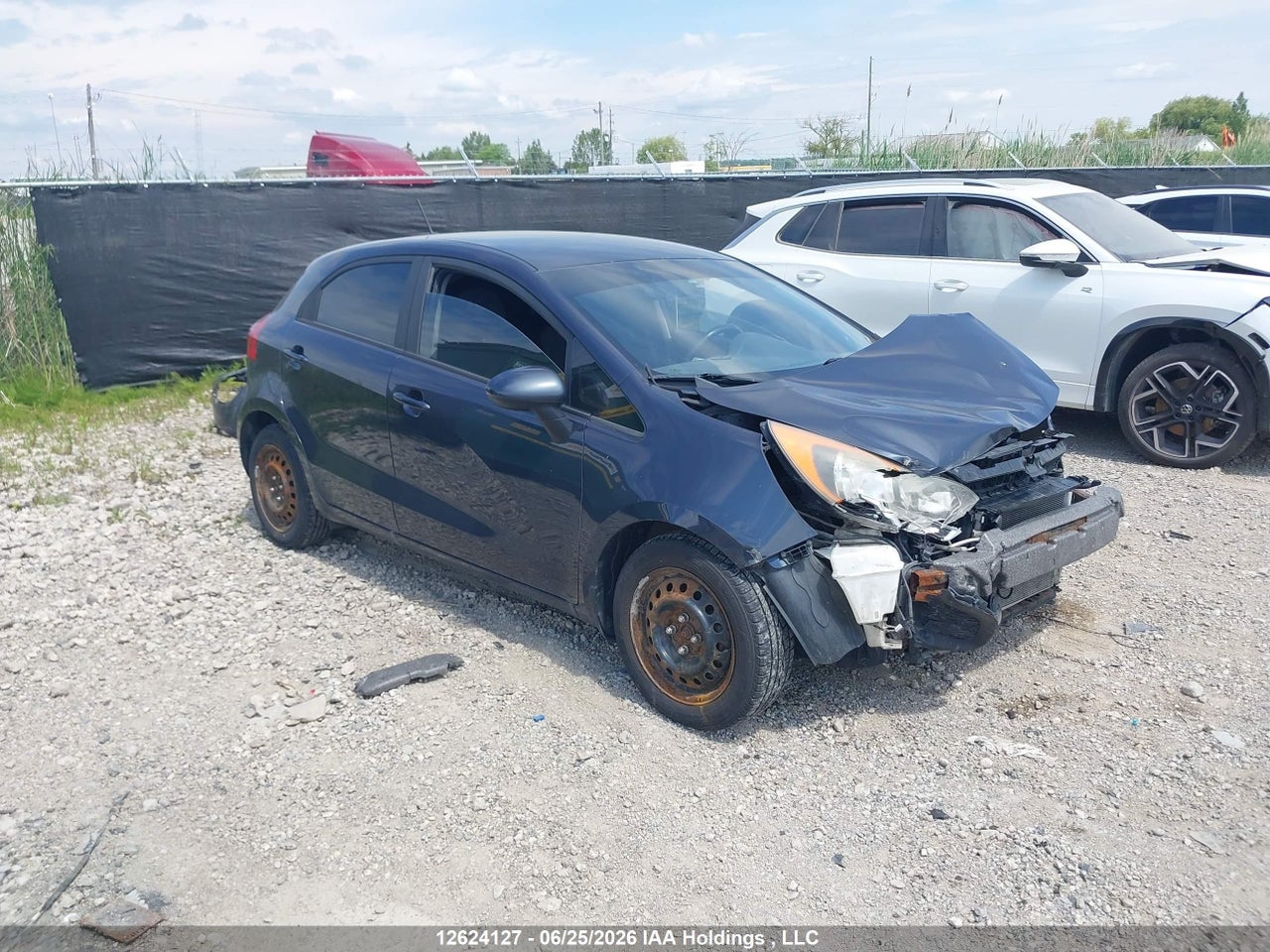 KNADM5A32F6978918 · 2015 KIA RIO LX