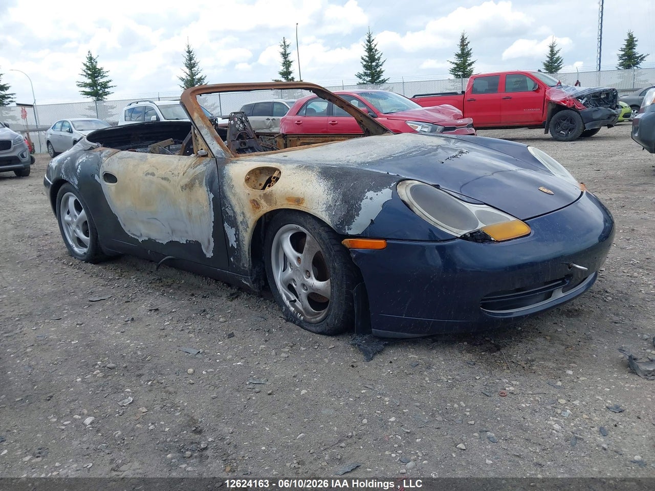 WP0CA2995XS****** · 1999 PORSCHE 911 CARRERA/CARRERA 4 · 1/12