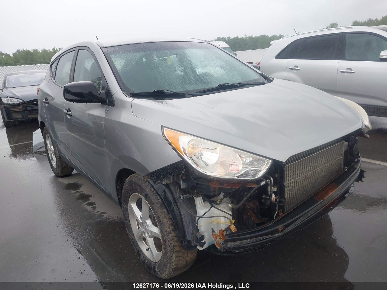 KM8JT3AC0CU509309 · 2012 HYUNDAI TUCSON GL