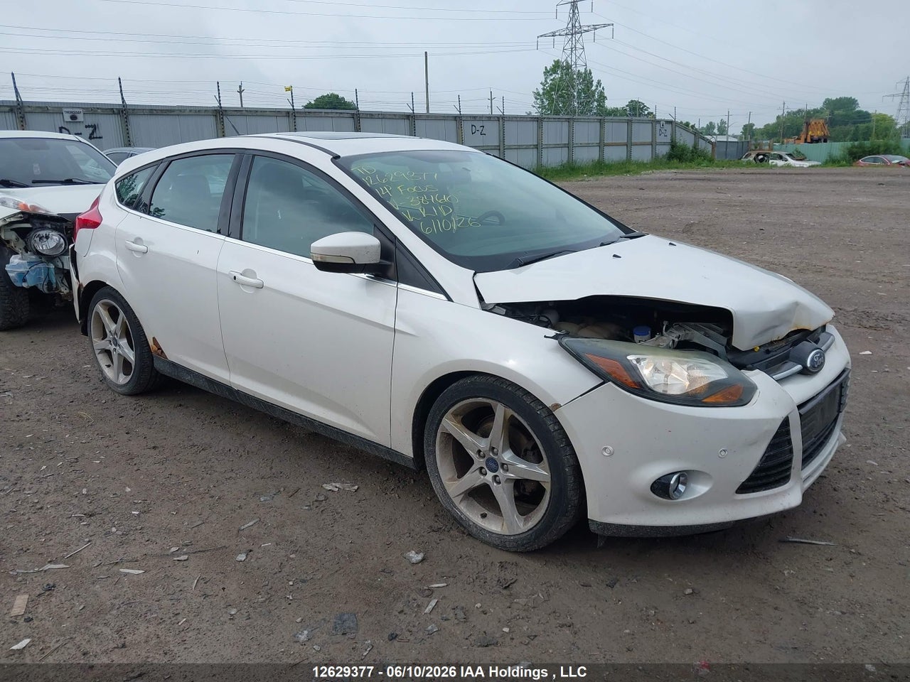 1FADP3N29EL384610 · 2014 FORD FOCUS TITANIUM