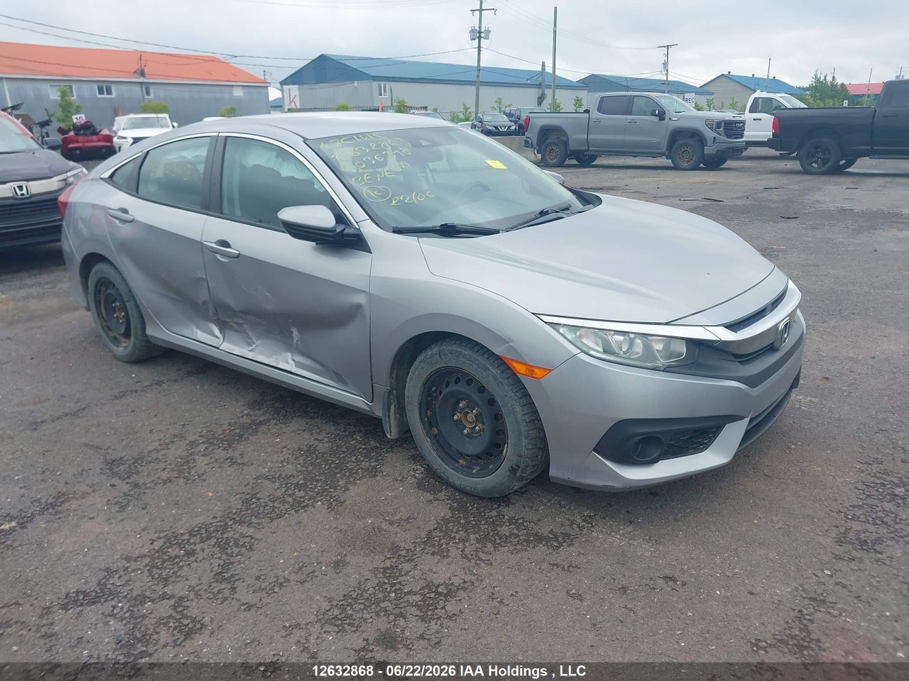 2HGFC2F61JH036318 · 2018 HONDA CIVIC SE