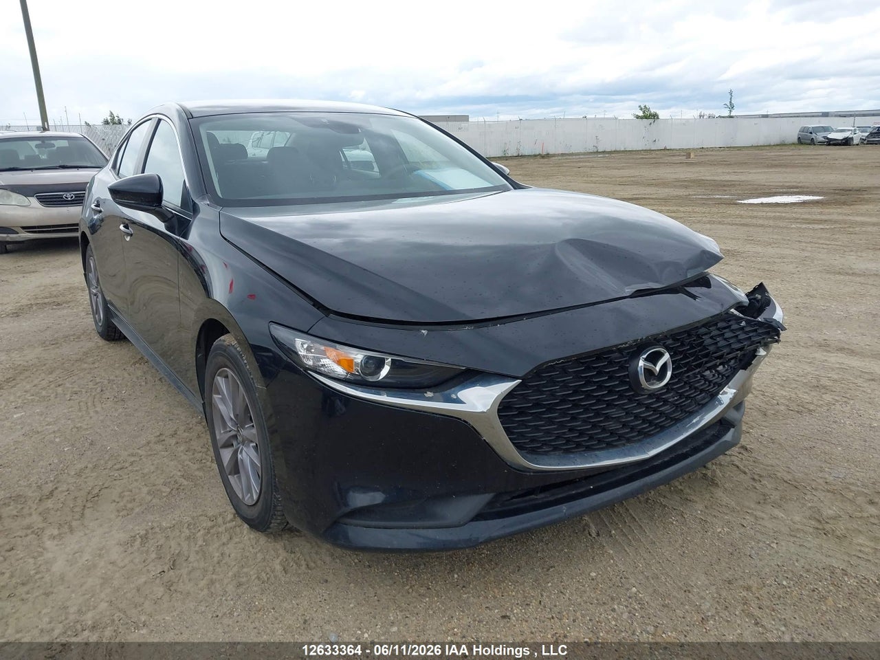 JM1BPAB73L1174972 · 2020 MAZDA 3