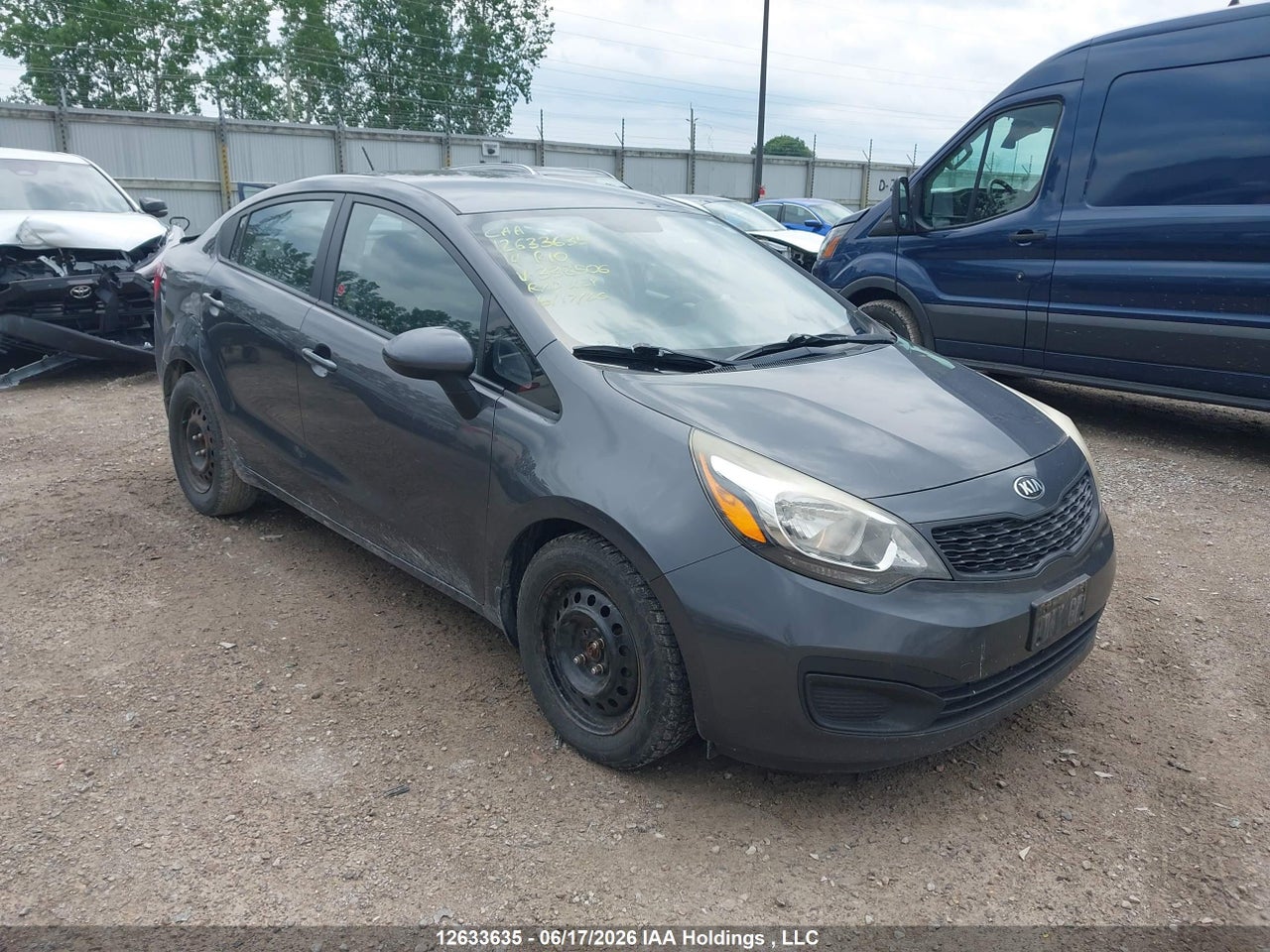 KNADM4A30E6338506 · 2014 KIA RIO LX