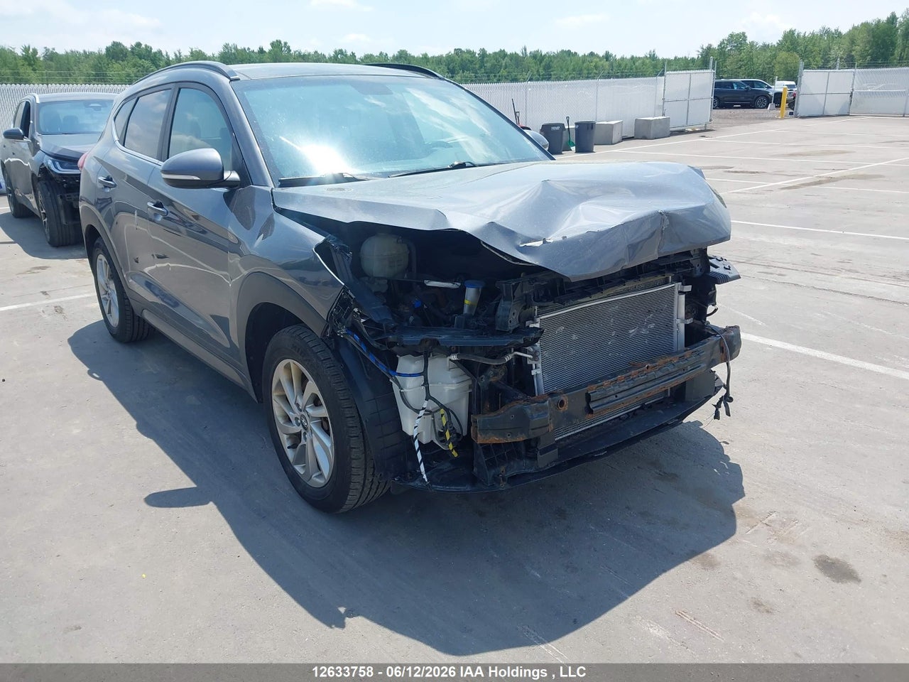 KM8J3CA41GU233043 · 2016 HYUNDAI TUCSON LUXURY