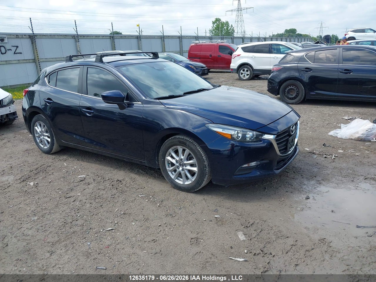 JM1BN1L7XJ1182570 · 2018 MAZDA MAZDA3