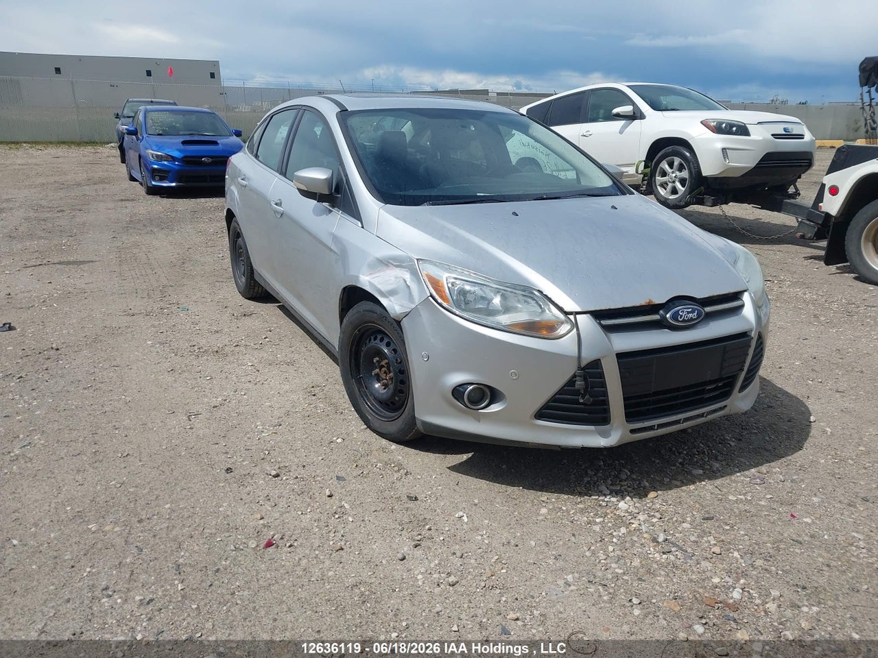 1FAHP3J24CL406422 · 2012 FORD FOCUS TITANIUM
