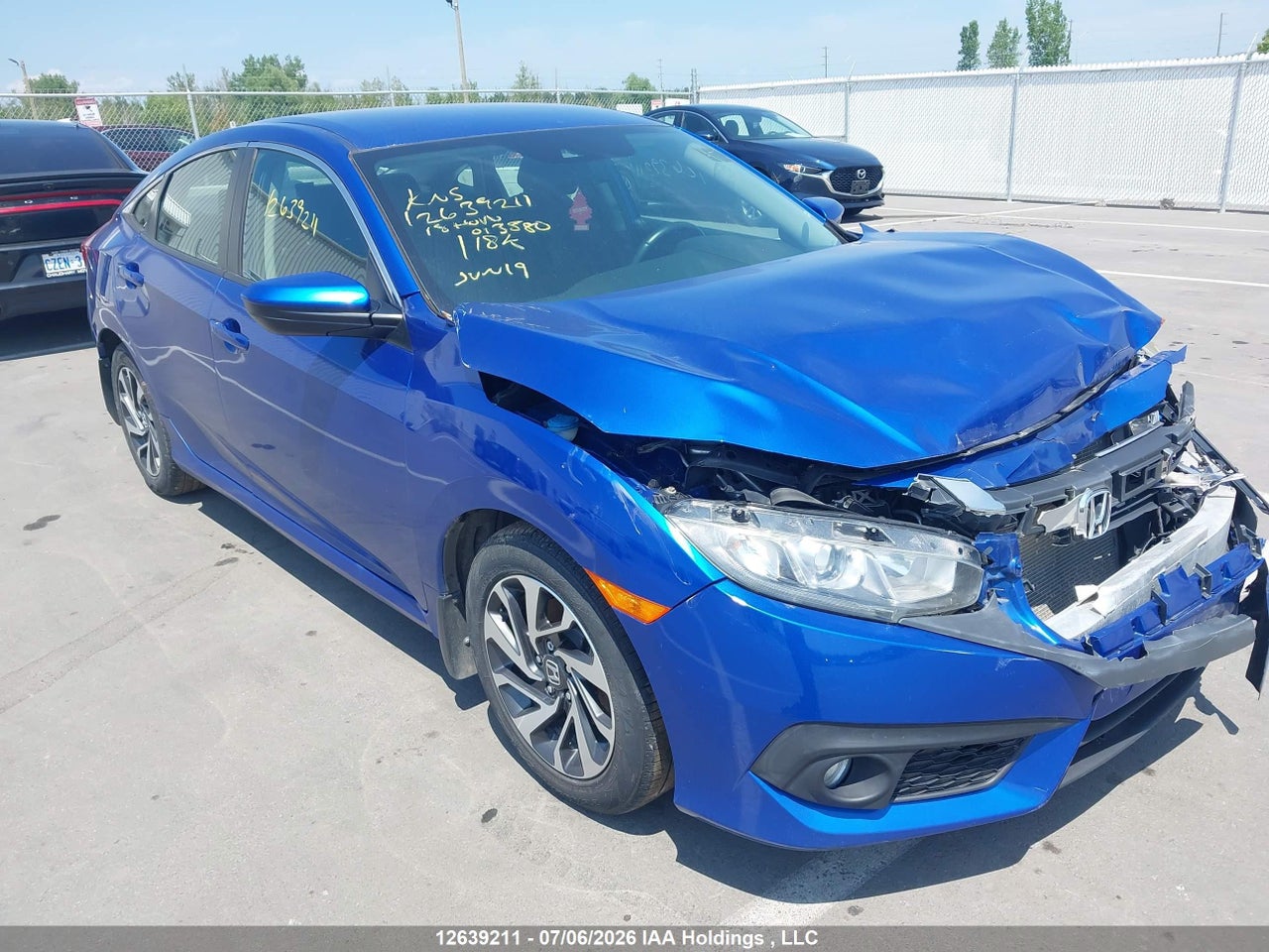 2HGFC2F69JH013580 · 2018 HONDA CIVIC SE
