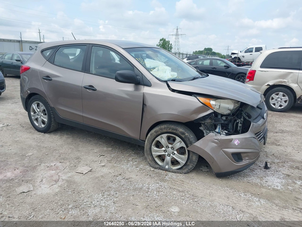 KM8JTCAC5CU371136 · 2012 HYUNDAI TUCSON GL