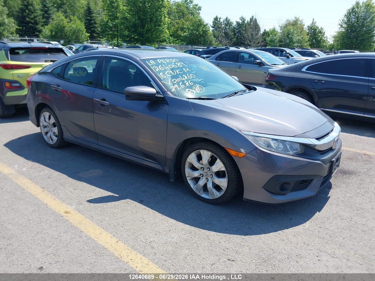 2HGFC2F8XJH004260 · 2018 HONDA CIVIC EX