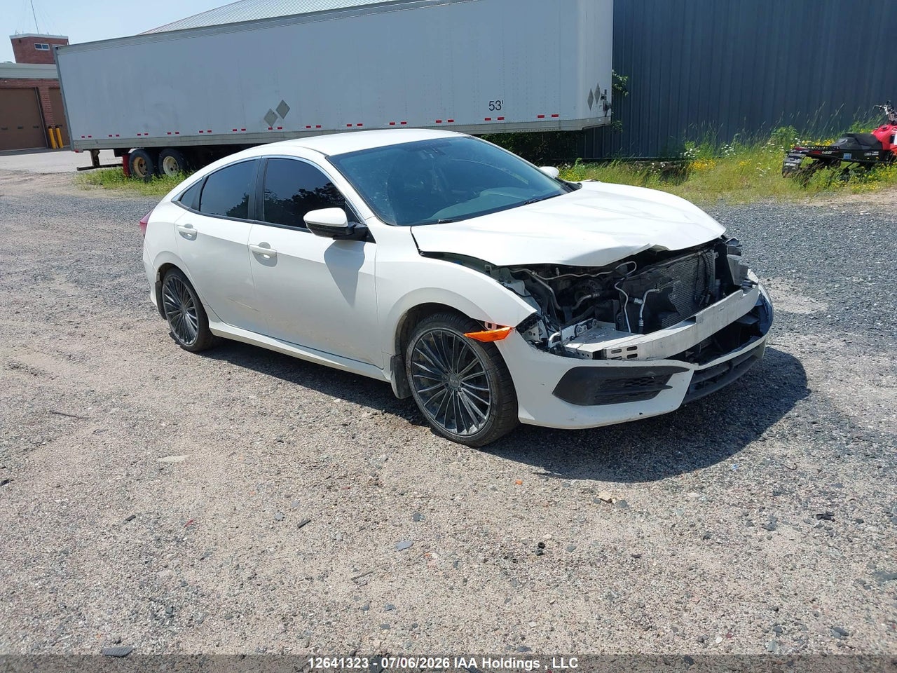 2HGFC2E57HH009059 · 2017 HONDA CIVIC LX · 1/12