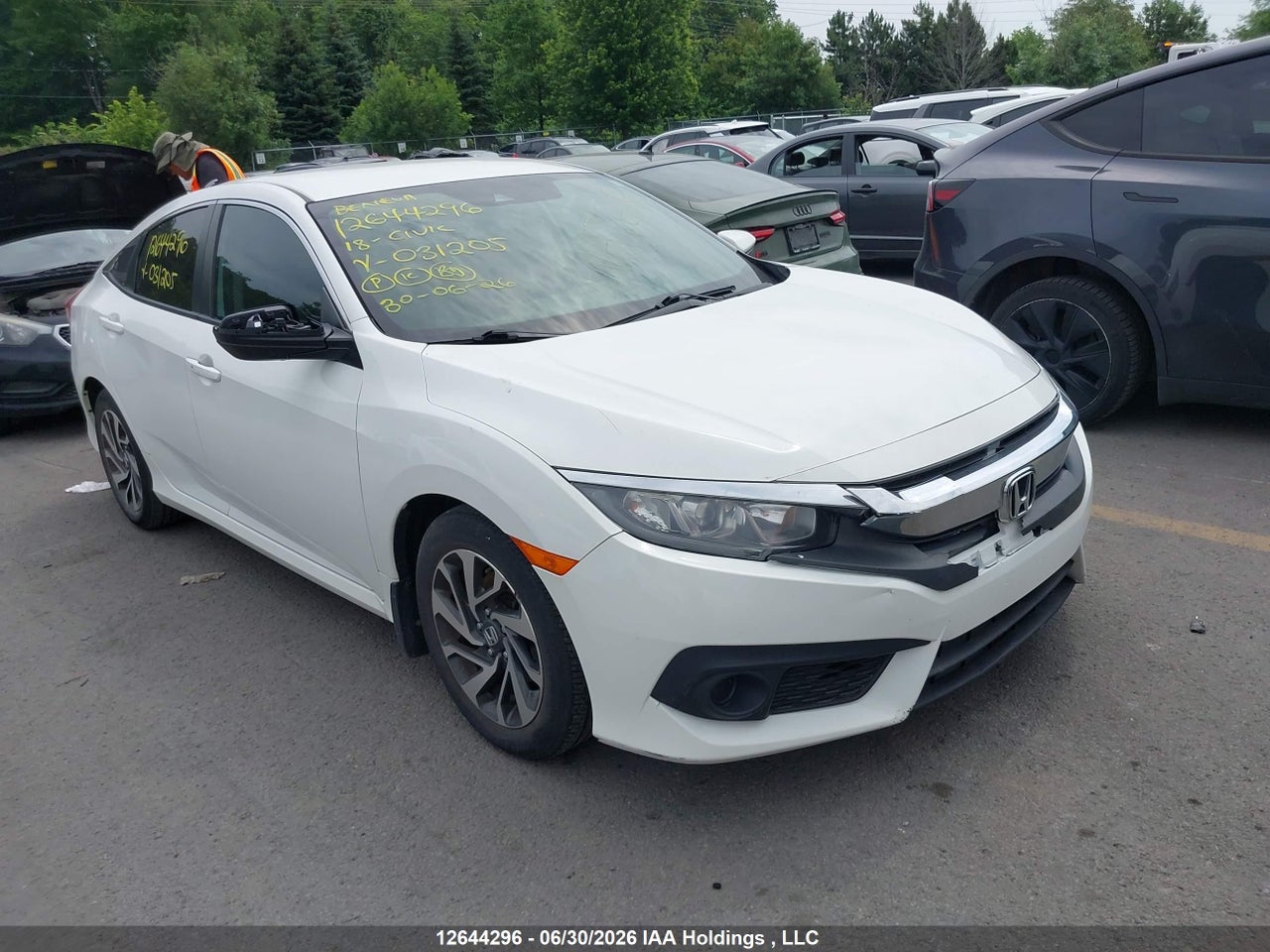 2HGFC2F67JH031205 · 2018 HONDA CIVIC SE