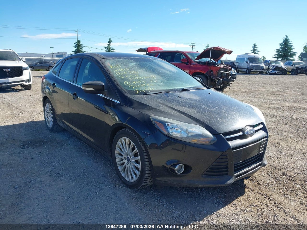 1FAHP3J23CL142576 · 2012 FORD FOCUS TITANIUM