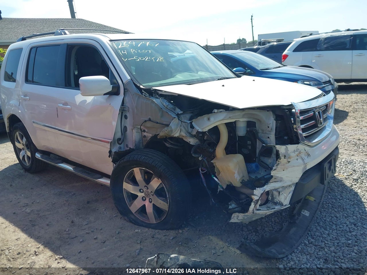 5FNYF4H97EB502928 · 2014 HONDA PILOT TOURING