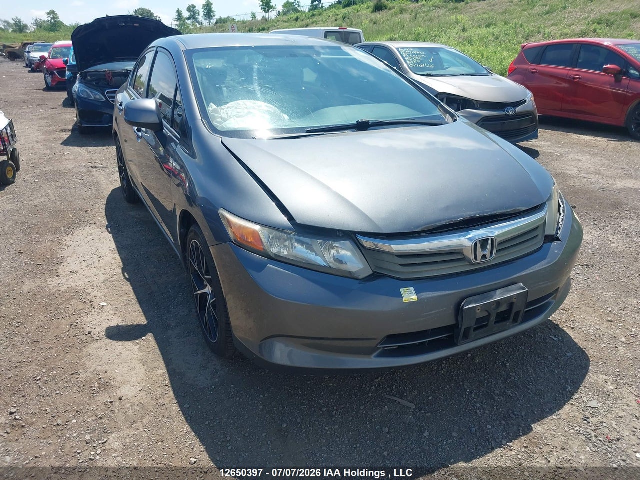 2HGFB2F40CH112700 · 2012 HONDA CIVIC LX · 1/12