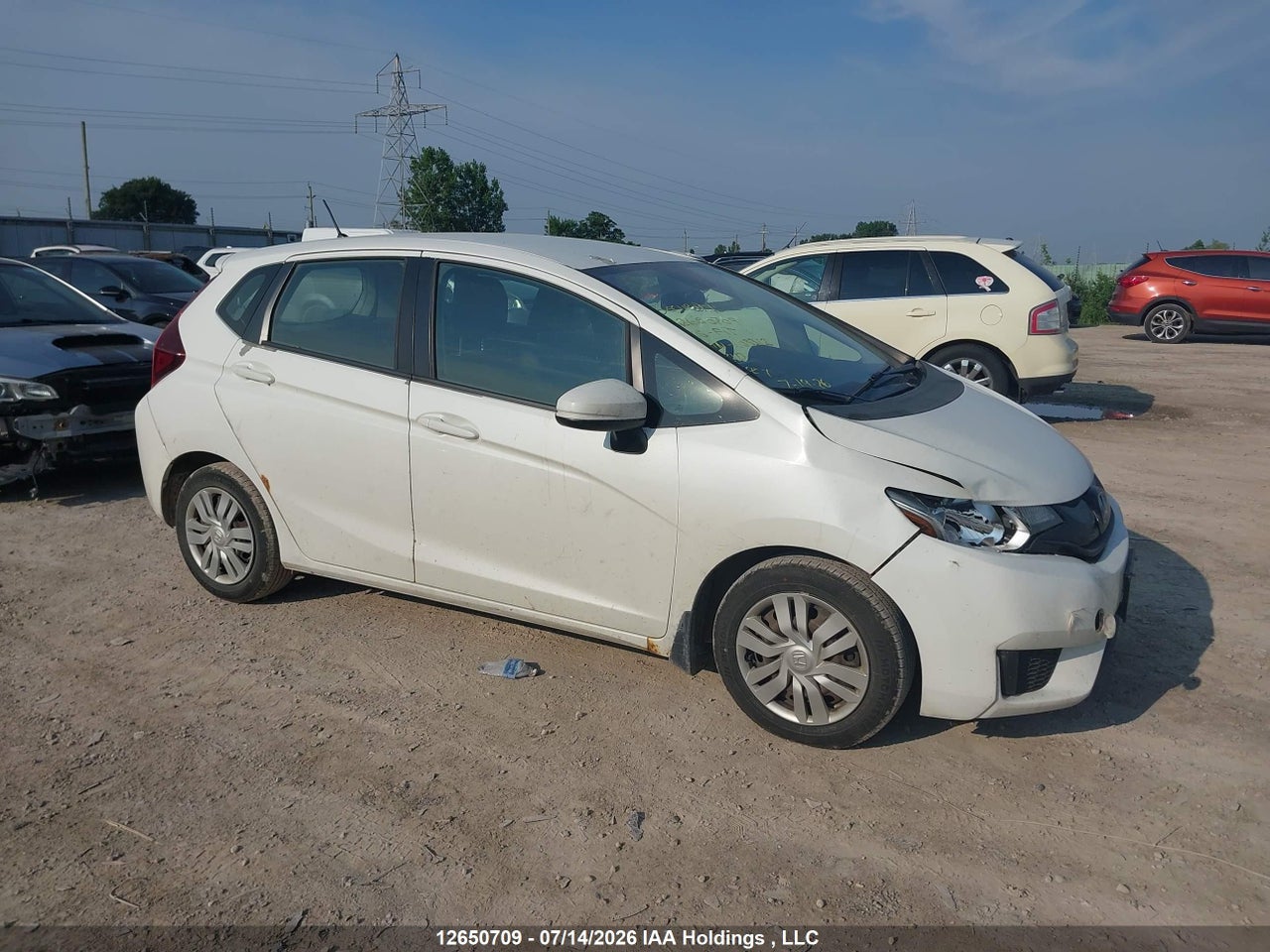 3HGGK5H5XFM103312 · 2015 HONDA FIT LX
