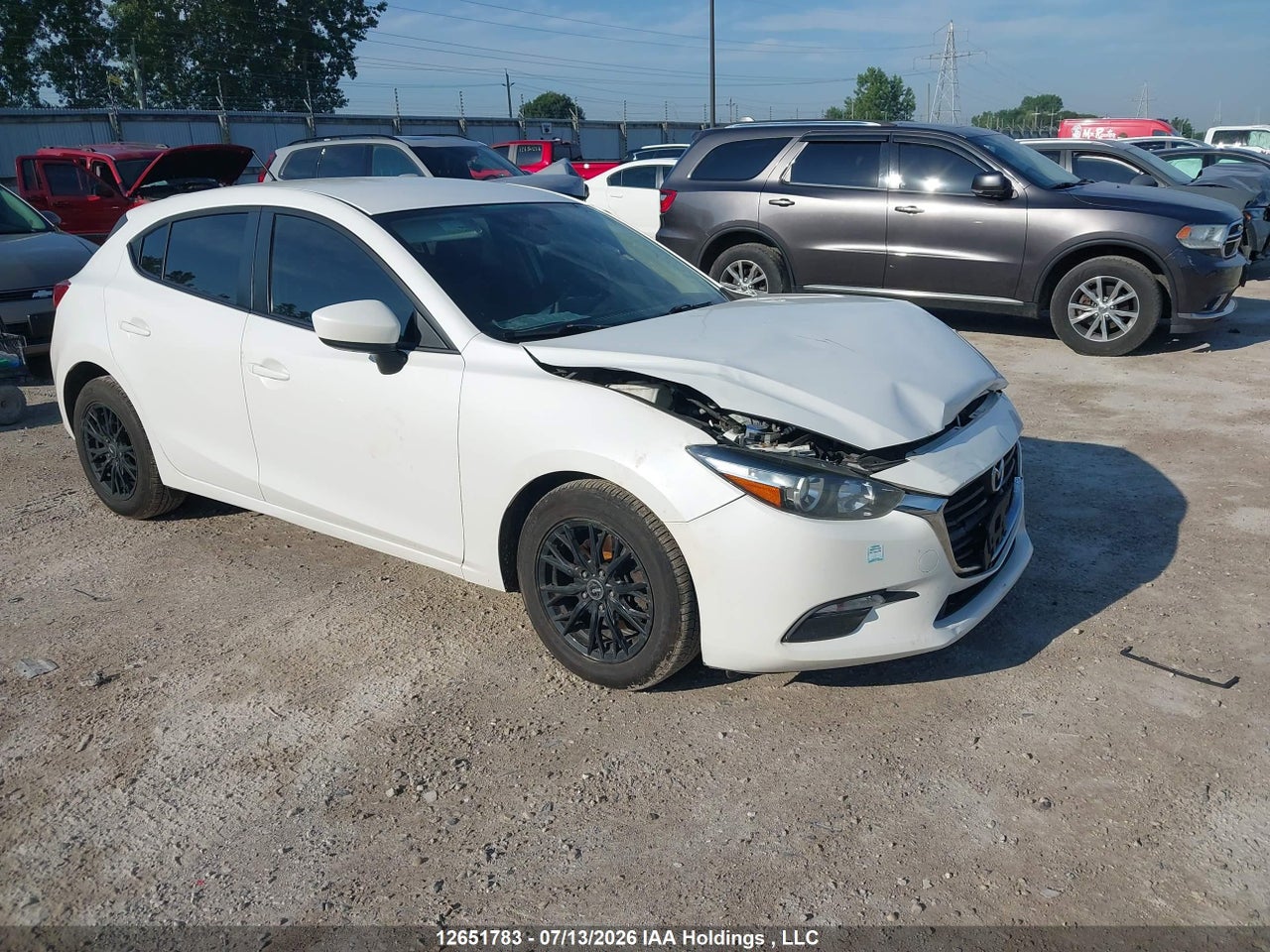 JM1BN1K7XH1106553 · 2017 MAZDA MAZDA3