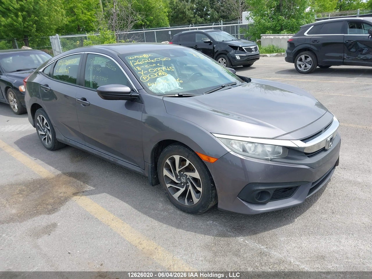 2HGFC2F64JH013745 · 2018 HONDA CIVIC SE