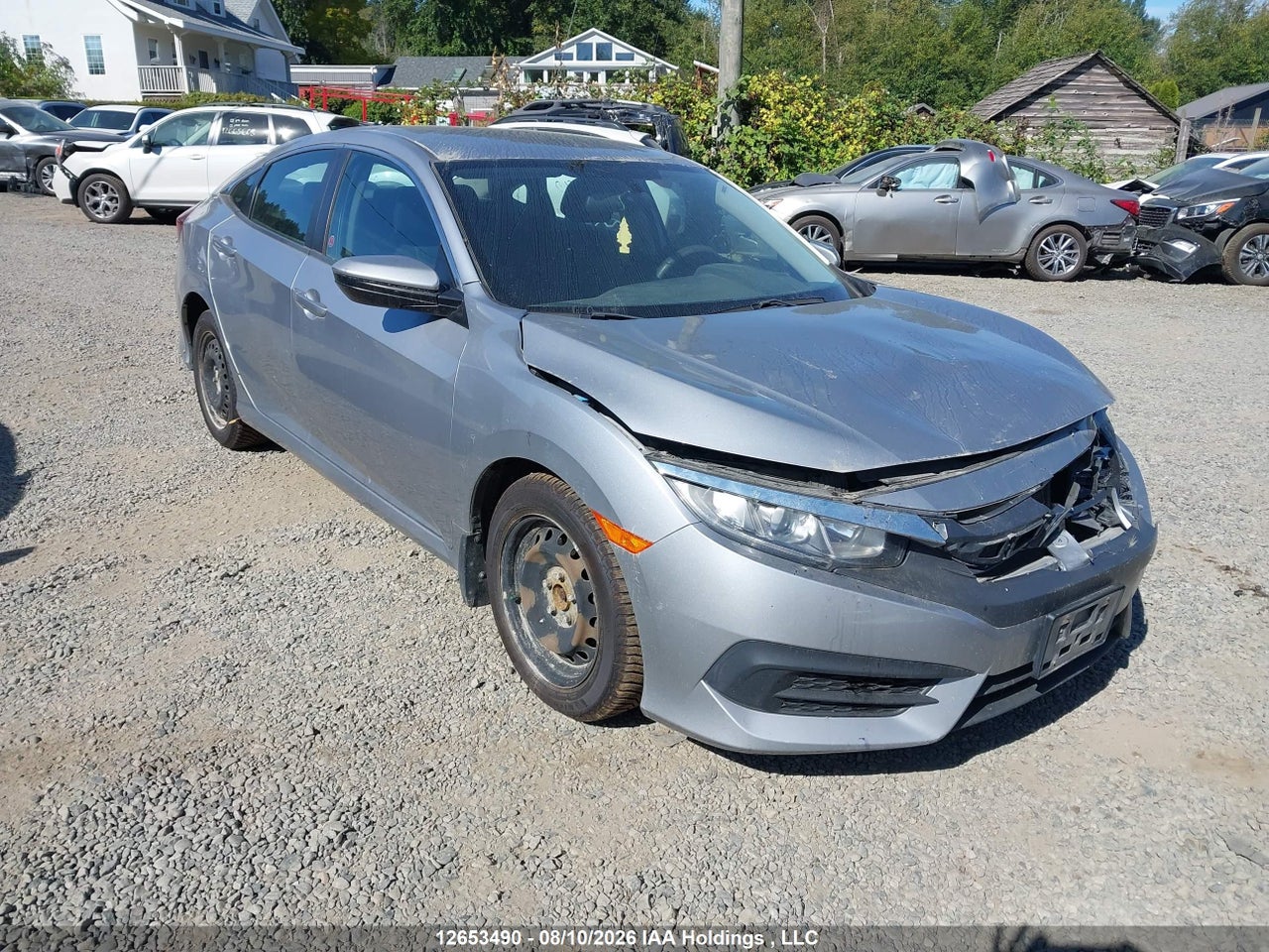 2HGFC2F59HH016013 · 2017 HONDA CIVIC LX