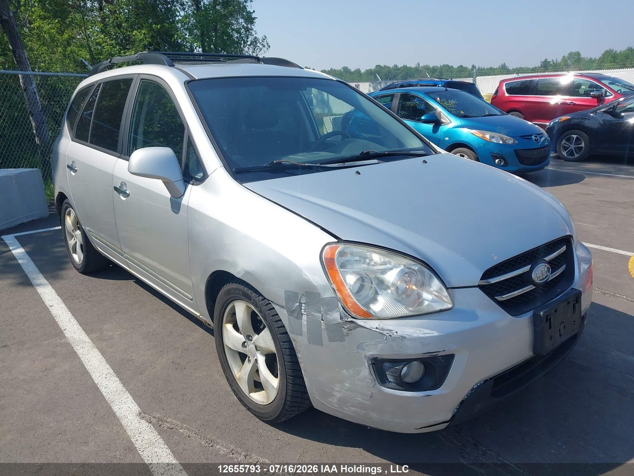 KNAFG526697275748 · 2009 KIA RONDO LX/EX · 1/12