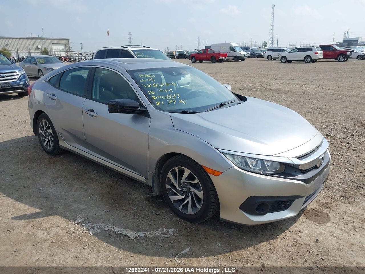 2HGFC2F85JH006613 · 2018 HONDA CIVIC EX
