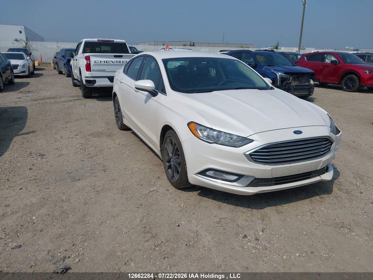 3FA6P0T9XJR123179 · 2018 FORD FUSION SE · 1/12