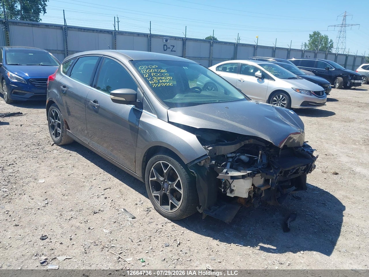 1FAHP3N29CL334689 · 2012 FORD FOCUS TITANIUM