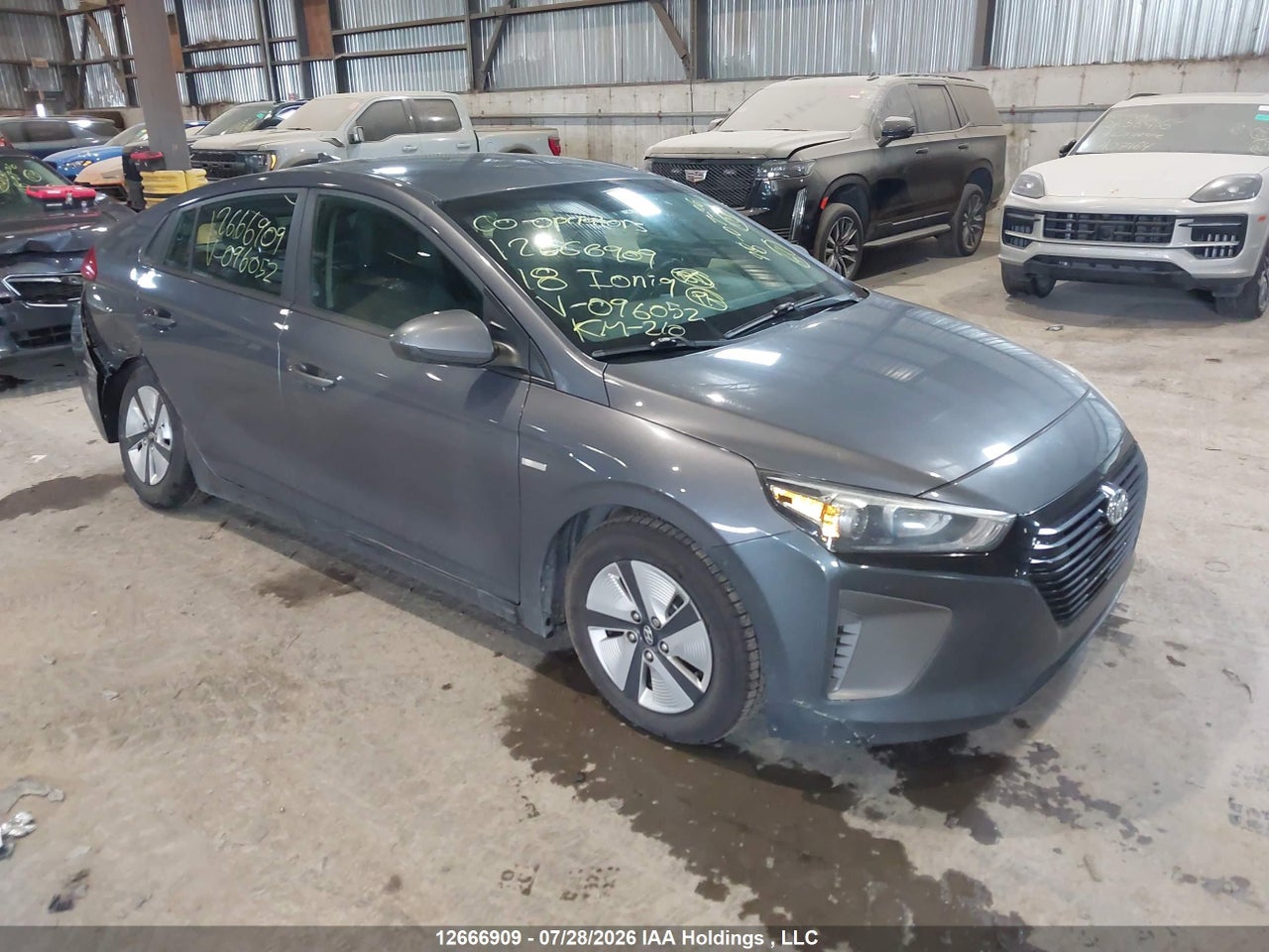 KMHC75LC0JU096052 · 2018 HYUNDAI IONIQ HYBRID BLUE · 1/12