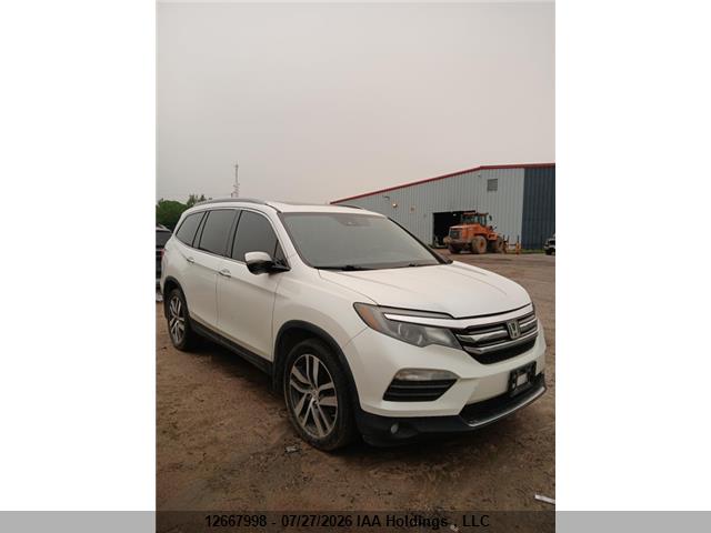 5FNYF6H98GB511023 · 2016 HONDA PILOT TOURING