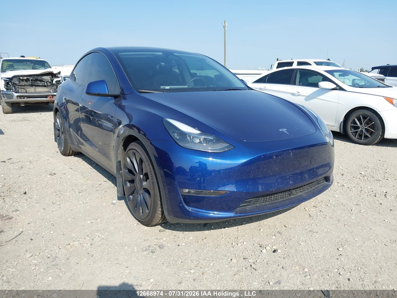 7SAYGDEF4RF053661 · 2024 TESLA MODEL Y PERFORMANCE · 1/12