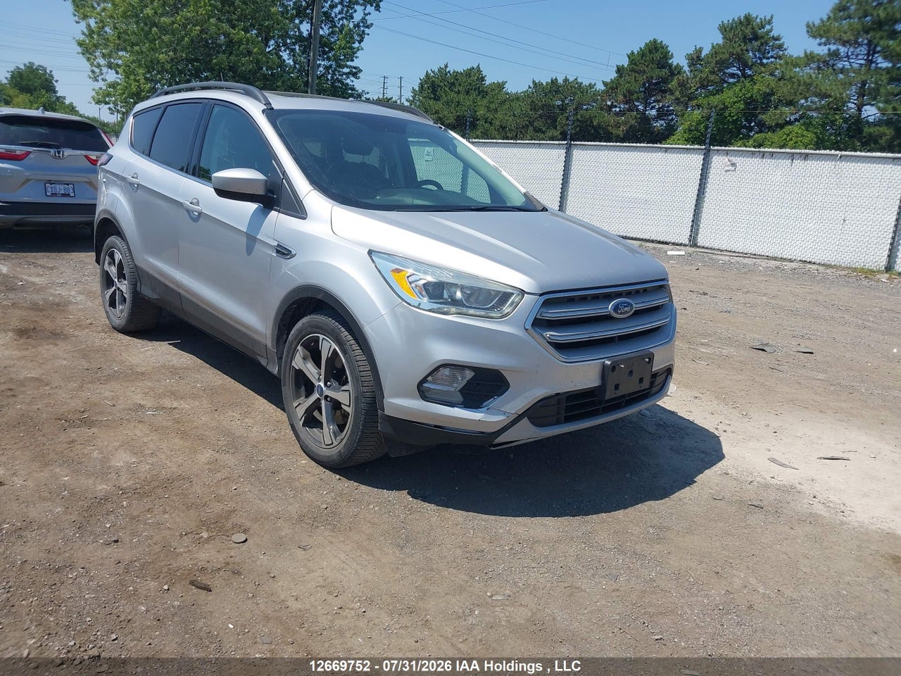 1FMCU9HDXJUA25698 · 2018 FORD ESCAPE SEL
