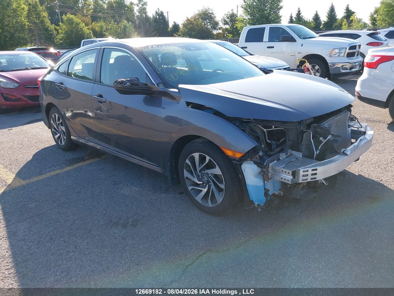 2HGFC2F60JH011779 · 2018 HONDA CIVIC SE · 1/12