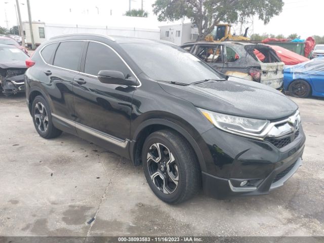 Auction sale of the 2017 Honda Cr-v Touring, vin: 7FARW1H99HE028735, lot number: 38093583