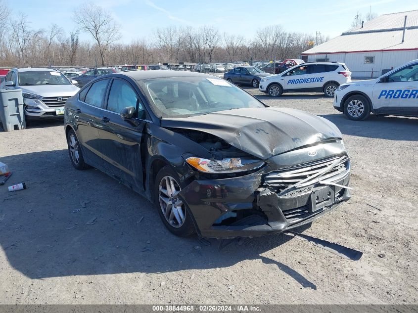 Lot #2506948537 2013 FORD FUSION SE salvage car