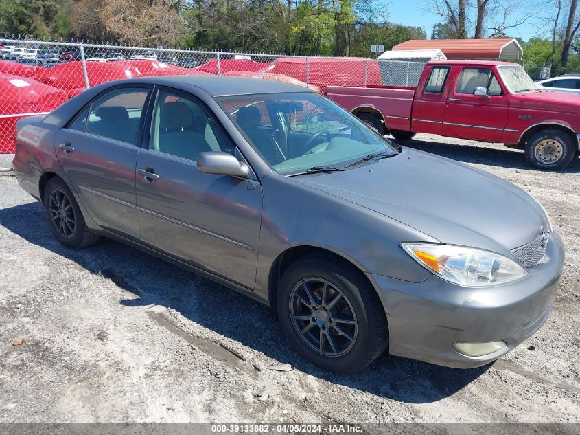 Lot #2506939488 2003 TOYOTA CAMRY XLE salvage car