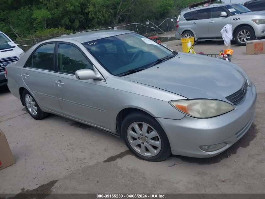 Lot #2490860626 2004 TOYOTA CAMRY XLE salvage car