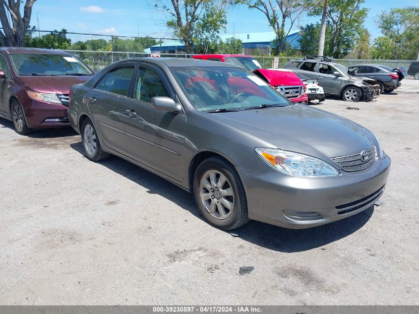 Lot #2474512654 2002 TOYOTA CAMRY XLE salvage car